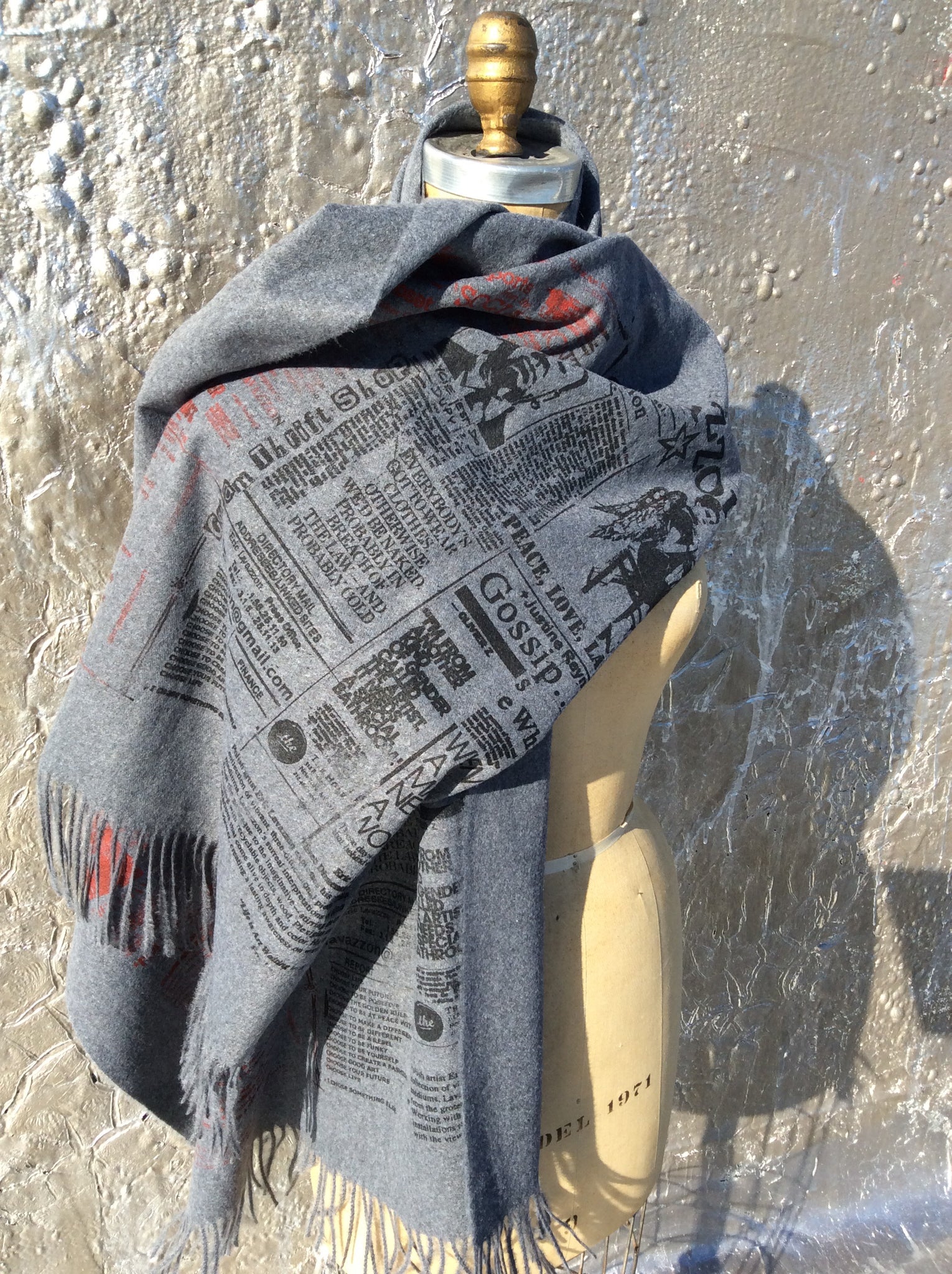 Lavazzon Cashmere feel newsprint scarf. Unisex