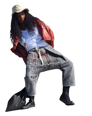 Newsprint low crotch drop pants . Adjustable, one-size, unisex