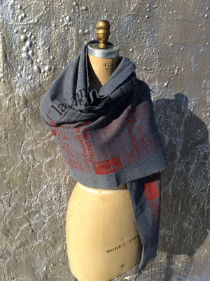 Lavazzon Cashmere feel newsprint scarf. Unisex